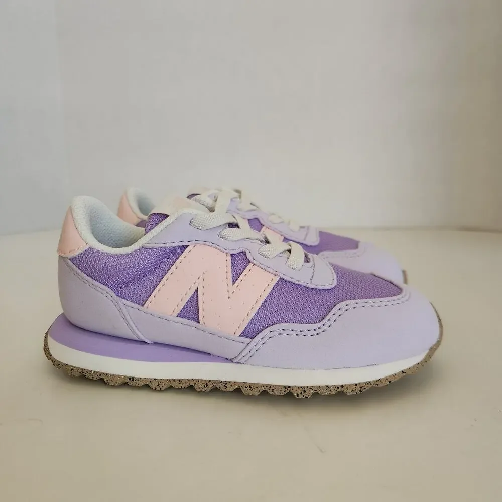 New Balance Kid's 237 V1 Bungee Sneaker, Lilac Glo/Shell Pink, 9 M Toddler